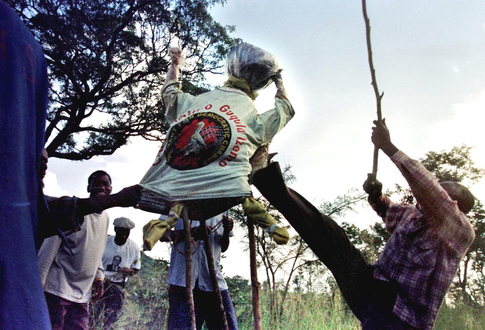  Zimbabwean war veterans kick and beat an effigy of Tsvangirai as tensions flare over land occupations in April 2000. Photograph: Obed Zilwa/AP
